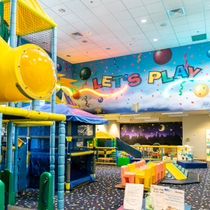 Vibrant colors and playful decor in our fun-filled supervised play area play. structure.